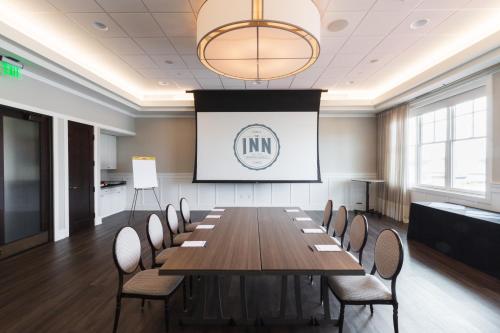 a conference room with a long table and chairs at The Inn at Harbor Shores in Saint Joseph