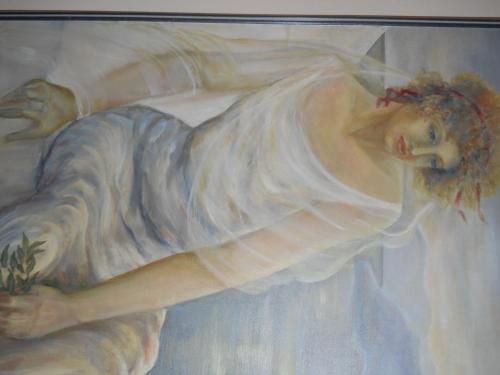 a painting of a woman in a white dress at Villa Ianthia in Galaxidhion