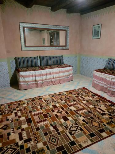 Postel nebo postele na pokoji v ubytování Abou El Leef villa