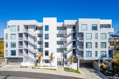an apartment building with white at Luxury on the River 4 Beds 2.5 Bath, Walk to Downtown in Nashville