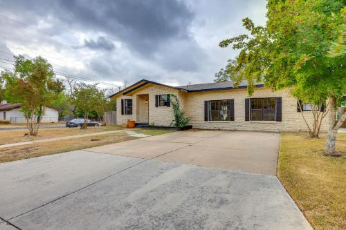 a house with a driveway in front of it at Less Than 1 Mi to Dtwn Home with Fenced Yard in Boerne! in Boerne