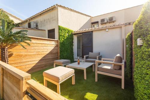 Greenwood - Villa design 2 chambres terrasses Heliovillage - Village Naturiste
