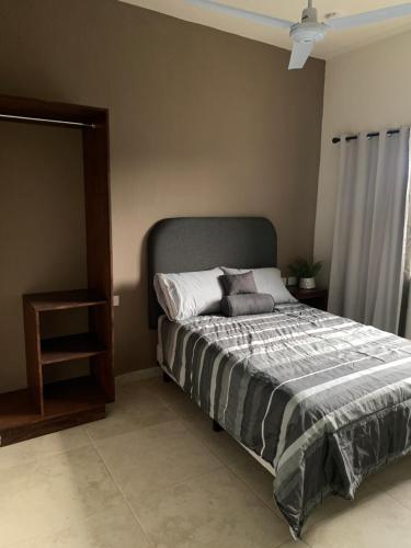 Postel nebo postele na pokoji v ubytování Hotel and Suites Hortensias