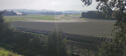 a view of a race track in a field at Alby's apartment, nella Motor Valley con parcheggio privato in Formigine