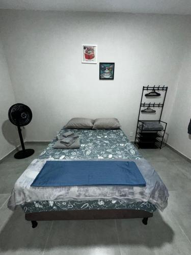 Ένα ή περισσότερα κρεβάτια σε δωμάτιο στο Casa Juza Saquarema