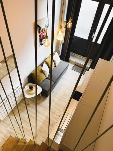 Ένα ή περισσότερα κρεβάτια σε δωμάτιο στο Appartement Canut Lyon Croix-Rousse