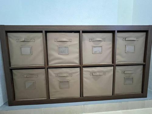 a shelf with four drawers in a wall at Casa Nueva con Alberca Puerto Vallarta in Puerto Vallarta