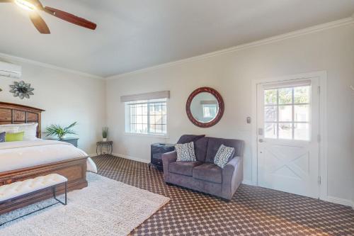 a bedroom with a bed and a chair and a mirror at Guglielmo Winery Casetta in Morgan Hill