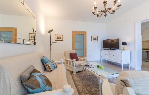 Televízia a/alebo spoločenská miestnosť v ubytovaní Holiday Home Poljicka Cesta