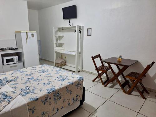 Kuchyň nebo kuchyňský kout v ubytování Kitnet 1 mobiliada no centro de Torres a 600m da Praia Grande