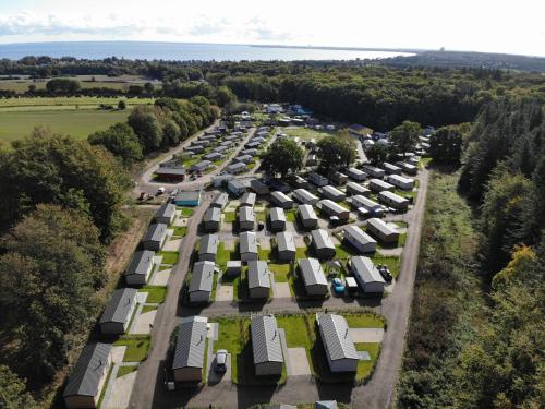 an aerial view of a parking lot with parked buses at Ostseecamp Ferienhaus "Pier 99" in Scharbeutz