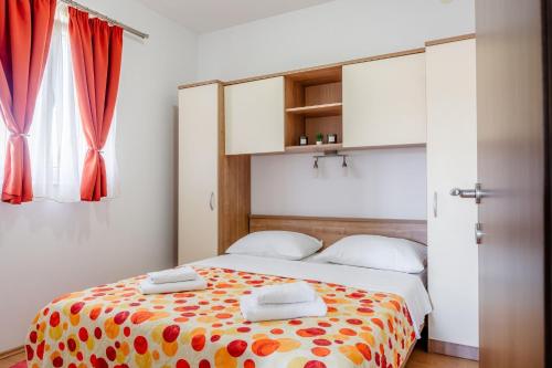 Voodi või voodid majutusasutuse Apartments with parking space Privlaka, Zadar - 23587 toas