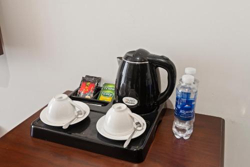 Kemudahan buat kopi dan teh di Bradi Gate- 22Land Residence Hotel