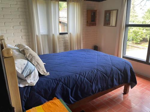 Ένα ή περισσότερα κρεβάτια σε δωμάτιο στο Casas de campo en Avandaro
