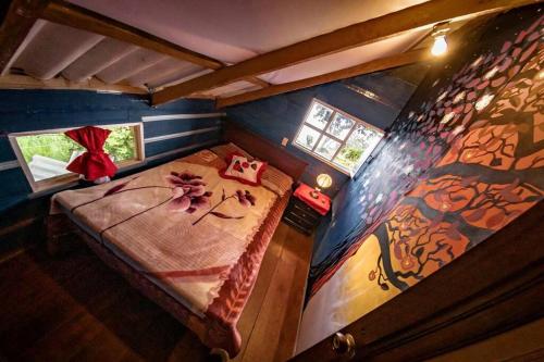 Cabaña Colibri Carnavalにあるベッド