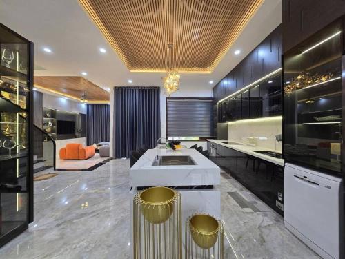 a kitchen with a sink and a counter top at Cy sea villa 3 in Da Nang