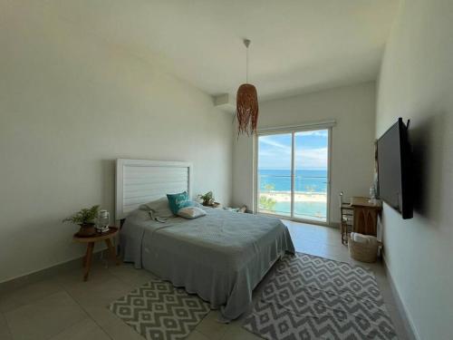 Postel nebo postele na pokoji v ubytování Playa Escondida Ocean View 2BR