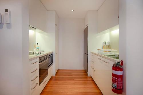 Køkken eller tekøkken på Beachfront on Bennetts Beaches Apartment 4