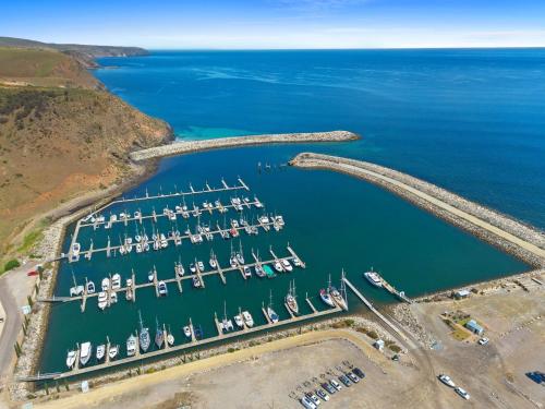an aerial view of a marina with boats in the water at Shoreline Escape in Wirrina Cove