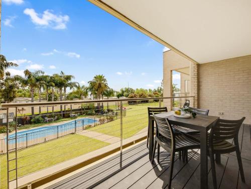 a view from the balcony of a house with a table and chairs at Elsinor 6 in Mulwala