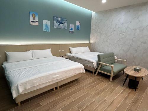 Una cama o camas en una habitación de 苞棧旅宿