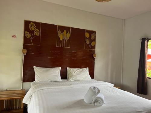 Postel nebo postele na pokoji v ubytování Namthip Homebeach
