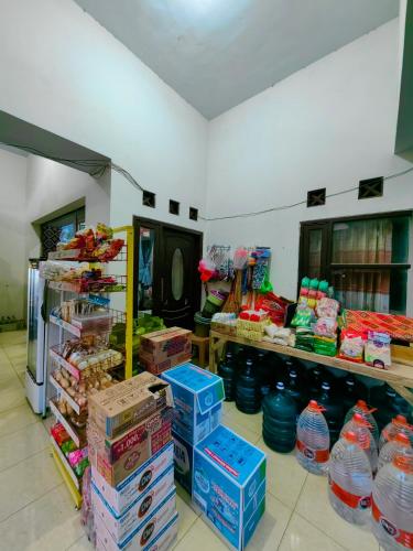 a store filled with lots of boxes of food at Nina Guest House UIN Malang in Ngadipuro