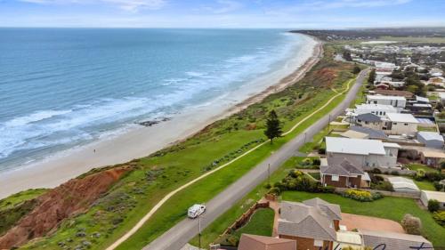 an aerial view of a beach with houses and the ocean at Oceans 19 by Wine Coast Holidays in Sellicks Beach