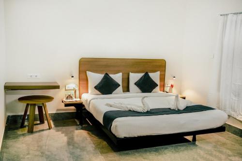 Postel nebo postele na pokoji v ubytování SM Residency
