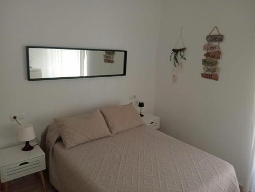 Postel nebo postele na pokoji v ubytování Apartamento Privado en Alameda de Hércules