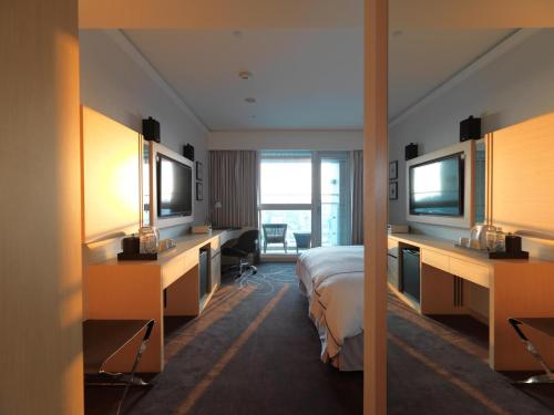 TV a/nebo společenská místnost v ubytování K Hotel Taipei Songjiang