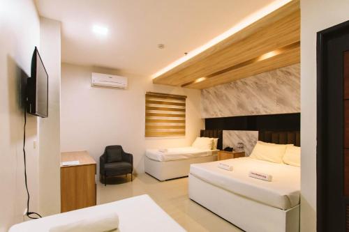 Postel nebo postele na pokoji v ubytování Vigan Traversa Hotel