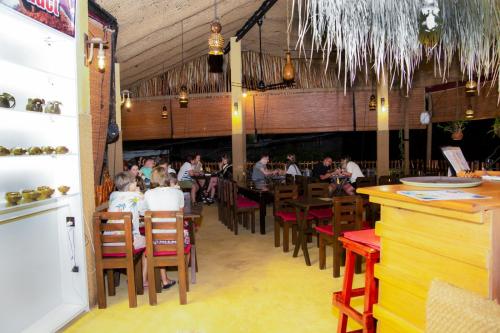 Restaurace v ubytování Coconut Style Restaurant & Milinda Guest