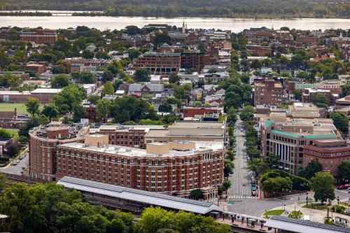 an aerial view of a large city with buildings at Hilton Alexandria Old Town in Alexandria