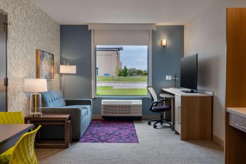 Télévision ou salle de divertissement dans l'établissement Home2 Suites By Hilton Ankeny