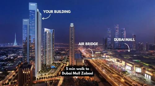 a view of a city at night with buildings at Premium Two-Bedroom Apartment with Private Balcony & Full Burj Khalifa Views by Al Fannan Holiday Homes in Dubai