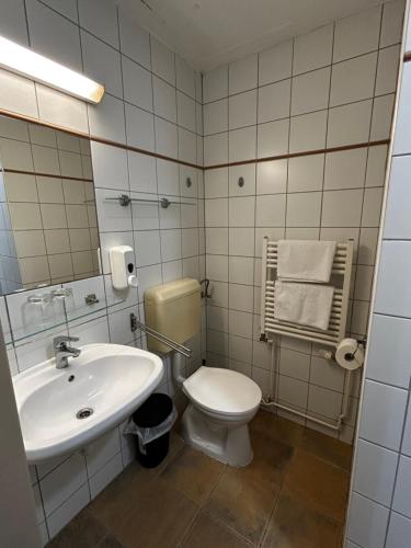 Ванная комната в City Budget Hotel