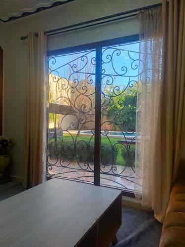 Ένα ή περισσότερα κρεβάτια σε δωμάτιο στο Villa avec piscine privée à ghmate route d'ourika