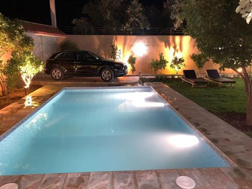 Πισίνα στο ή κοντά στο Villa avec piscine privée à ghmate route d'ourika