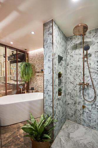 Ένα μπάνιο στο The Moment Chiangmai - Design Boutique Hotel