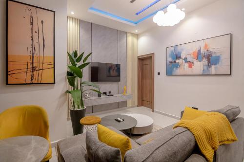 TV a/nebo společenská místnost v ubytování One90 Apartment