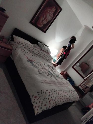 a bedroom with a bed with a stuffed animal on it at Tower Bridge - Saint Katherine's Dock in London