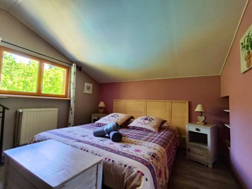 Posteľ alebo postele v izbe v ubytovaní Le Chalet Cosy piscine et spa
