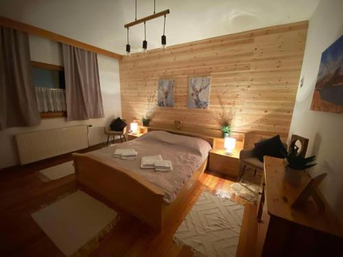 a bedroom with a large bed in a room at Gasthof Frasswirt in Frass