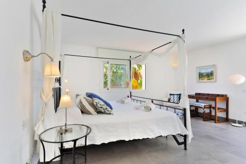 Ένα ή περισσότερα κρεβάτια σε δωμάτιο στο Villa Daria