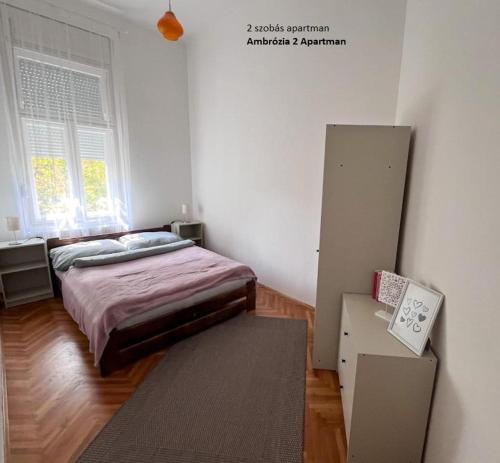 Ambrózia Apartmanにあるベッド