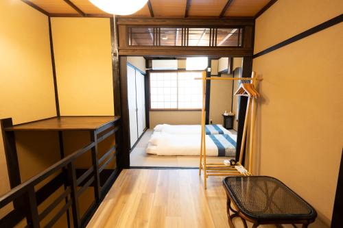 Ένα ή περισσότερα κρεβάτια σε δωμάτιο στο JPRESERVE Sakura