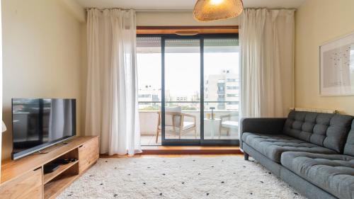 Apartamento com varanda e garagem