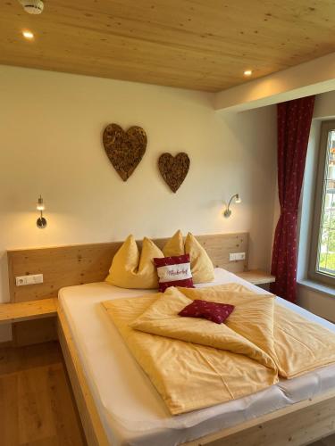 Una cama o camas en una habitación de Wöscherhof