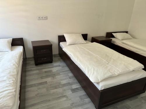 Postel nebo postele na pokoji v ubytování Guesthouse - R